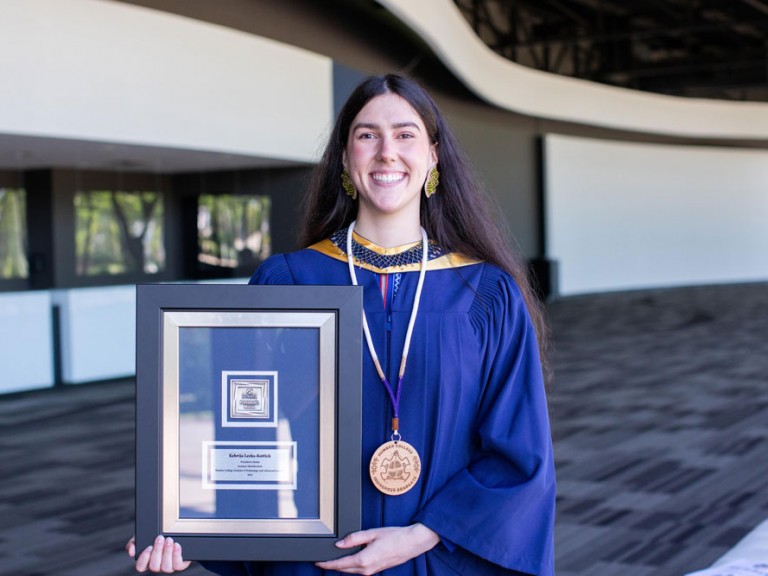 Waist up portrait of a Humber Indigenous graduate