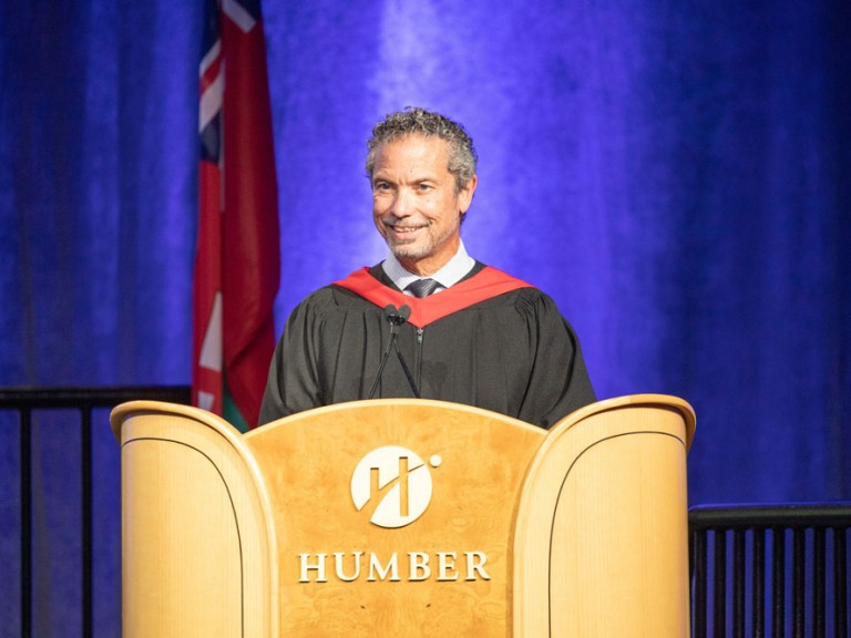 Humber faculty member standing at the podium
