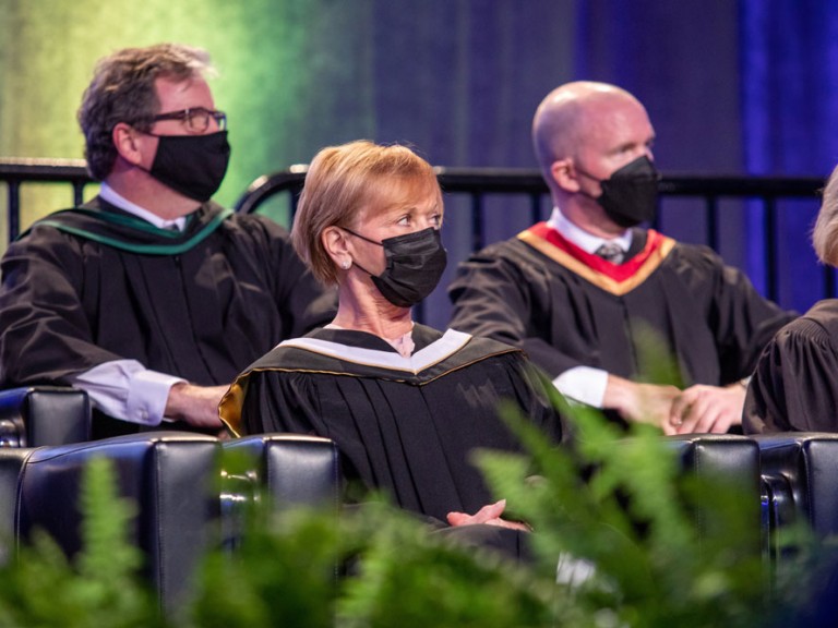 People on Stage looking at Humber Graduation Speakers