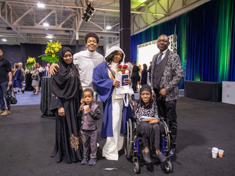 Humber graduate poses with family