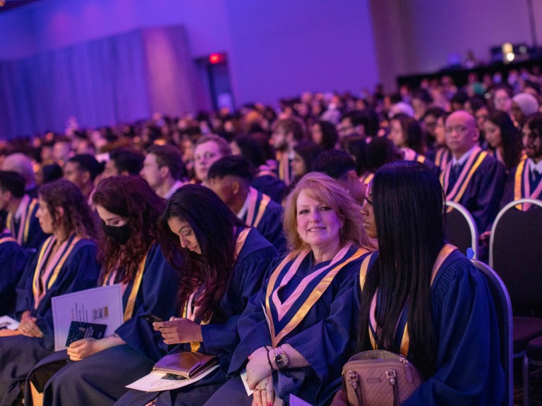 New Humber Graduates sitting through ceremony