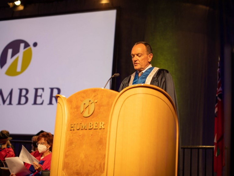 Former Humber president Chris Whitaker speaking at podium