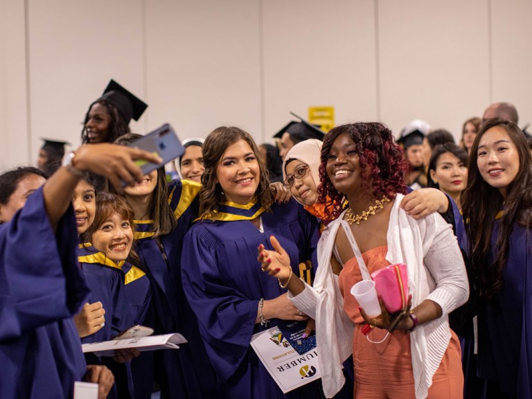 Graduates take selfie together