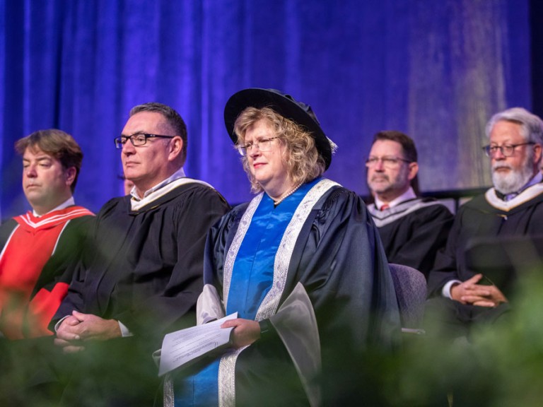 Humber faculty seated on stage