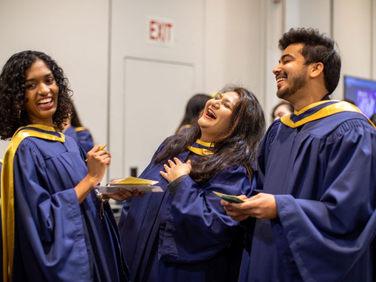 Grads laughing