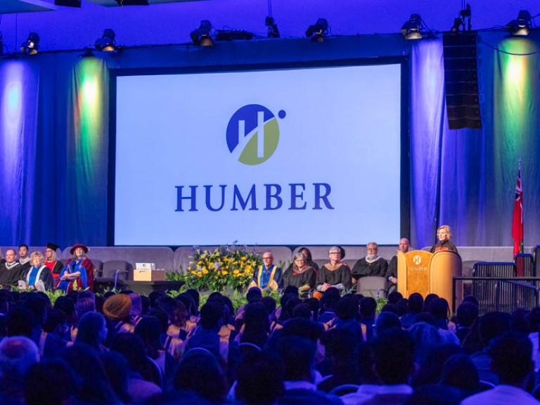 People seated on ceremony stage