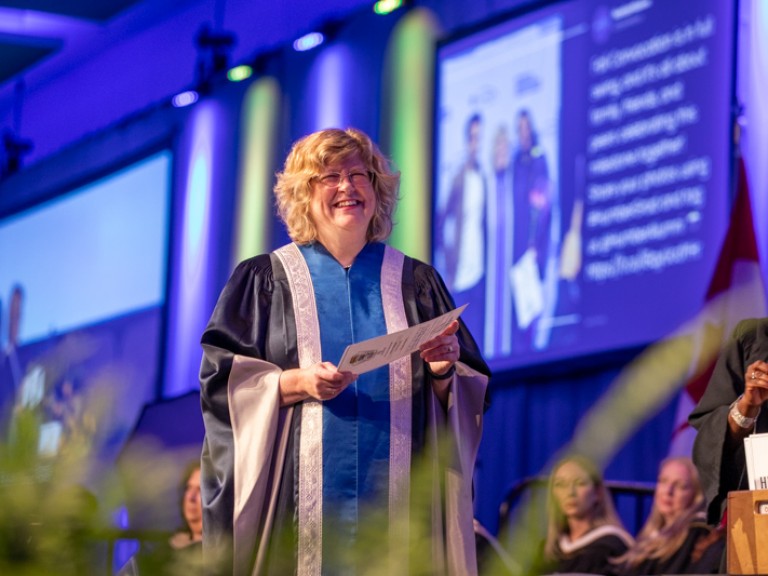 Humber president Ann Marie Vaughan smiles on stage