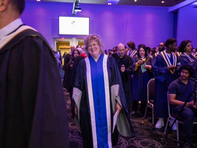 Humber president Ann Marie Vaughan entering the ceremony hall