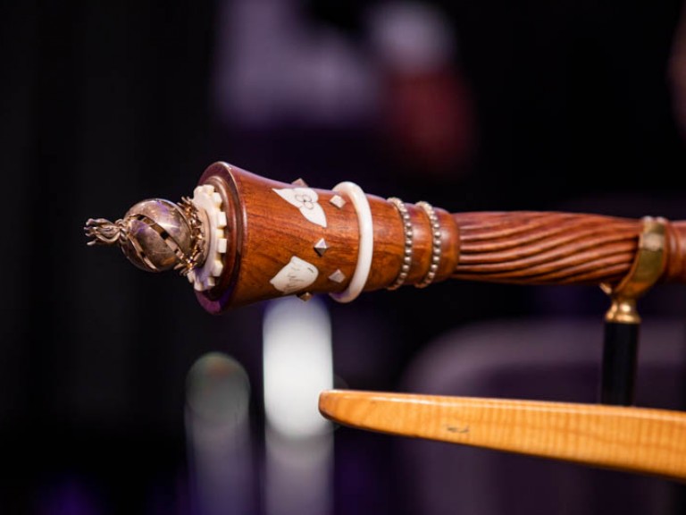 Decorative end of wooden staff