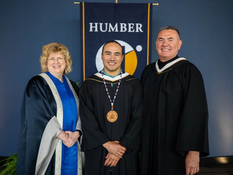 Michael Linklater posing for photo with Ann Marie Vaughan and Jason Seright, Leader of Inclusion & Belonging