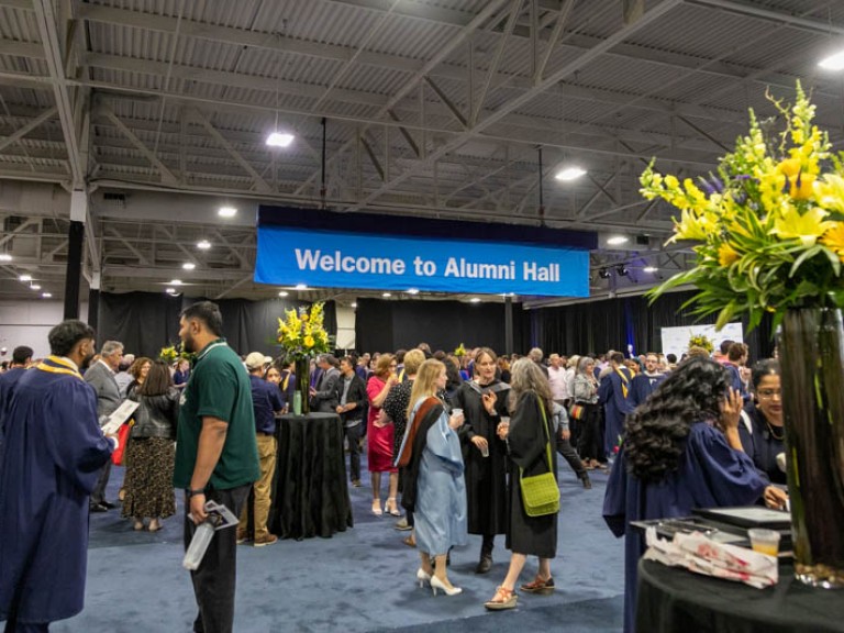 People mingling in Alumni hall