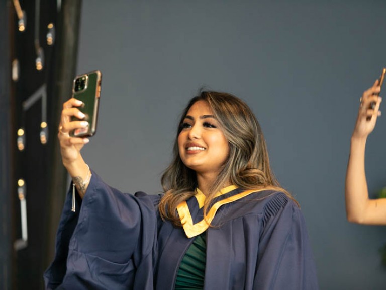 Graduate taking a selfie