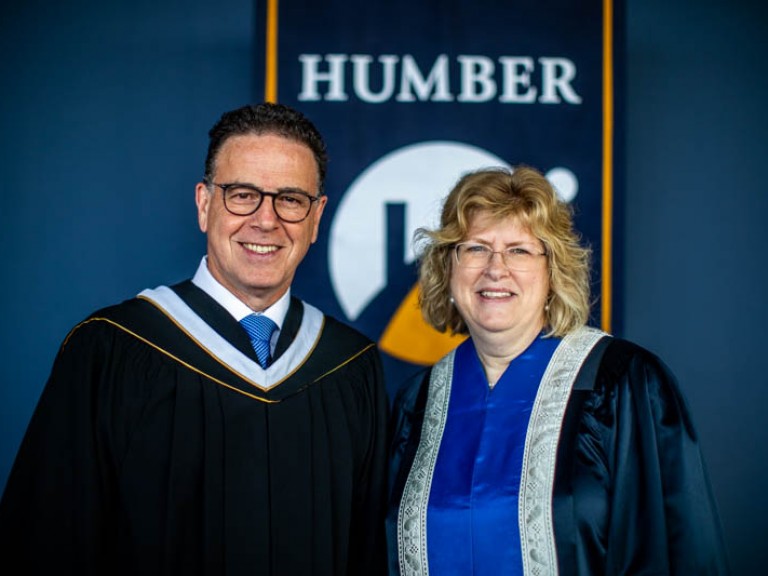 Anthony Longo and Humber president pose for photo