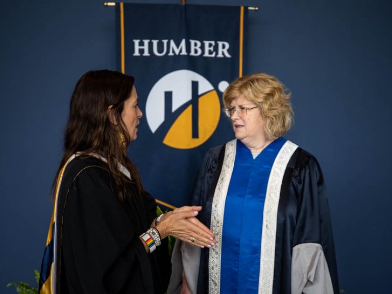Honorary degree recipient Chantal Kreviazuk talks with Humber president Ann Marie Vaughan