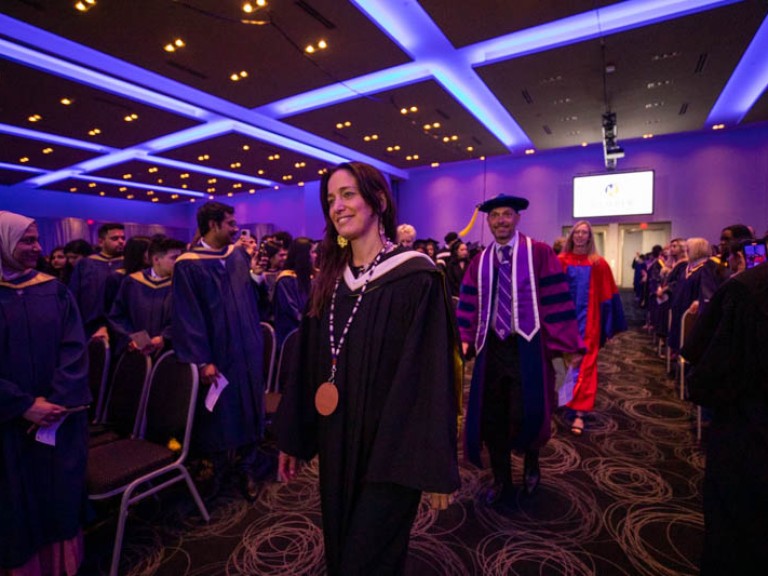 Honorary degree recipient Chantal Kreviazuk proceeds into ceremony hall