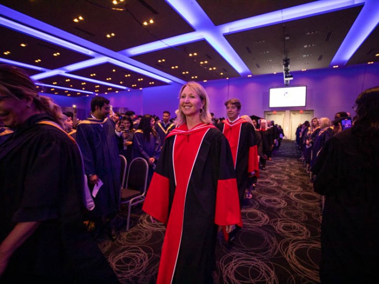 Faculty proceed into ceremony hall