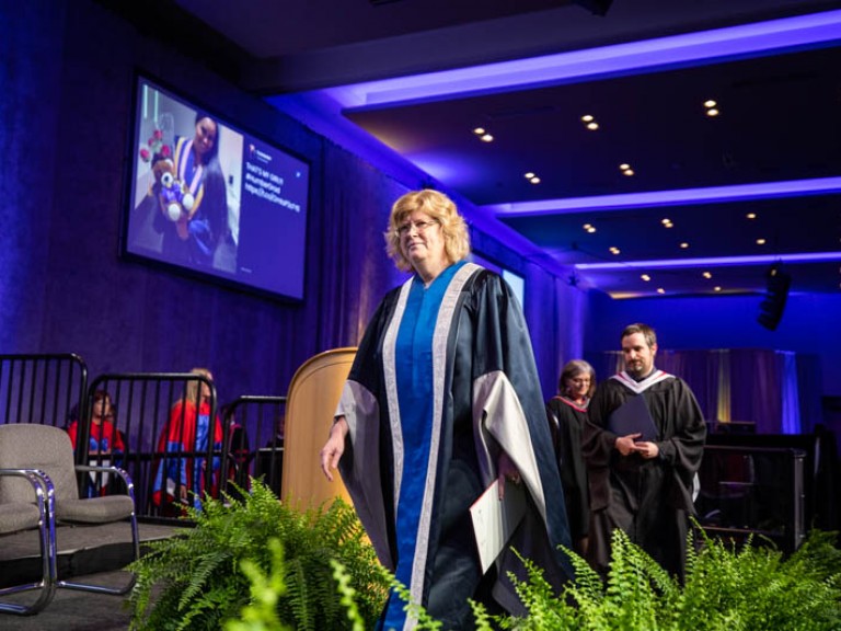 Humber president Ann Marie Vaughan walks on stage
