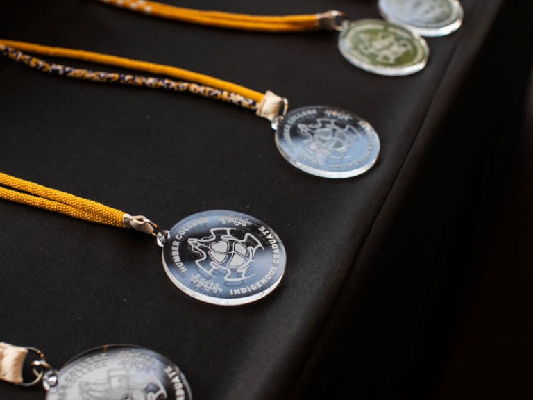 Close up shot of Indigenous graduate necklaces