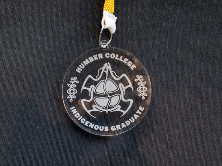 Humber College Indigenous graduate medallion