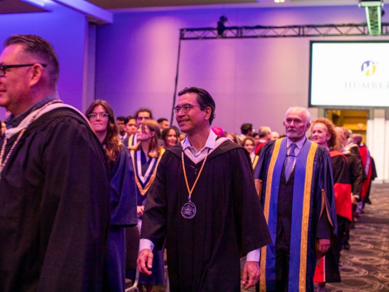 Humber faculty and honorary degree recipient file into ceremony