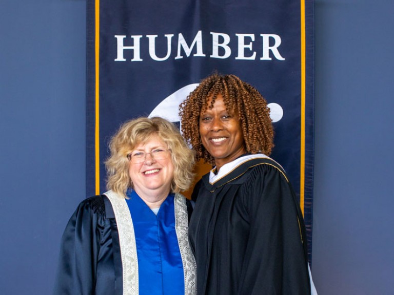 Honorary degree recipient Jacqueline Edwards smiles for photo with Humber president Ann Marie Vaughan