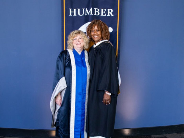 Jacqueline Edwards poses for photo with Humber president Ann Marie Vaughan