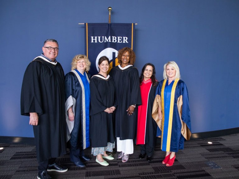 Jacqueline Edwards poses for photo with Humber president and four others