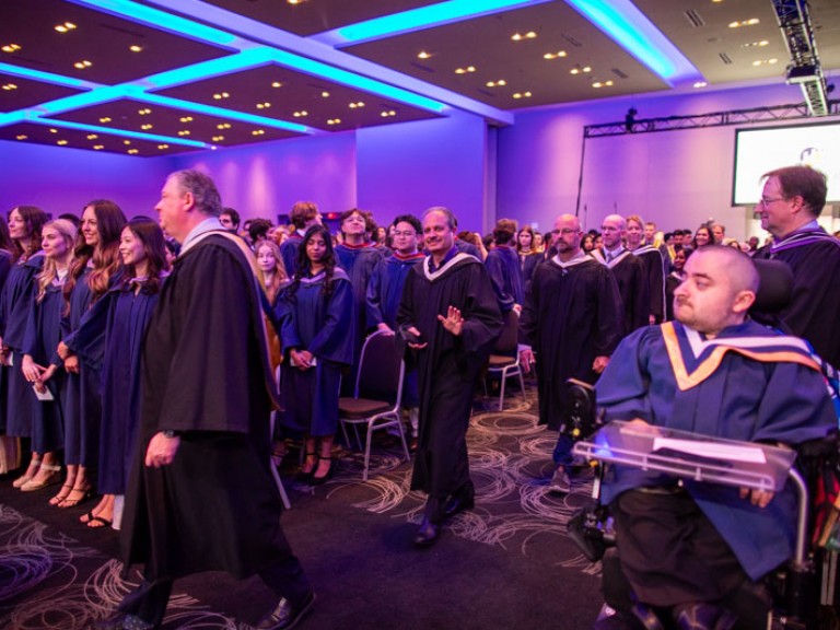 Humber faculty proceed into ceremony room