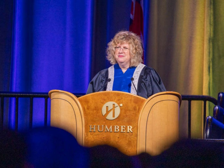 Humber president Ann Marie Vaughan behind Humber podium