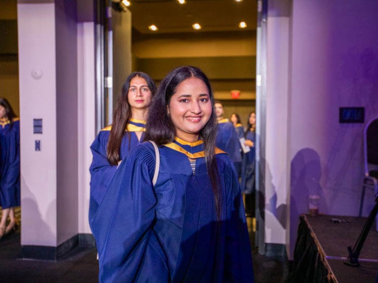 Graduate smiles