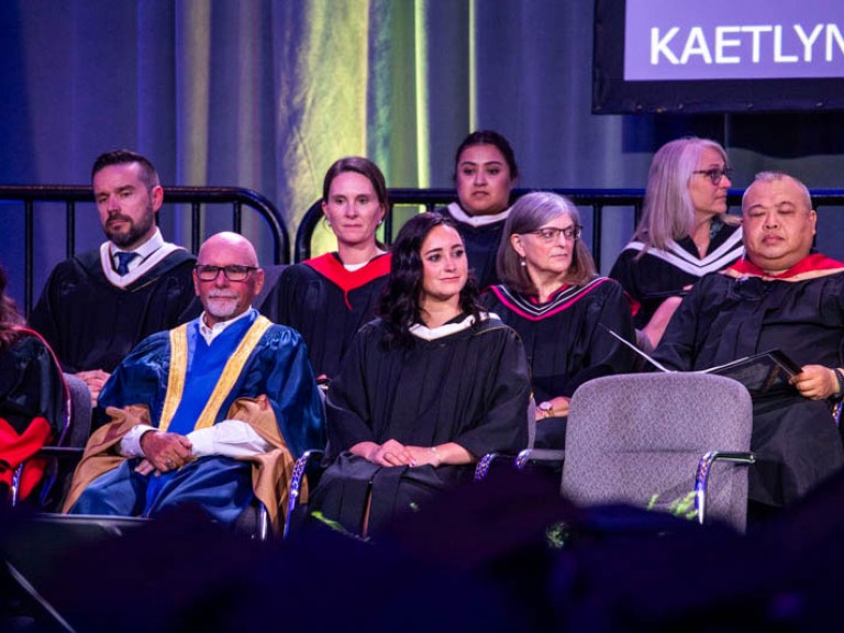 Humber faculty seated on stage