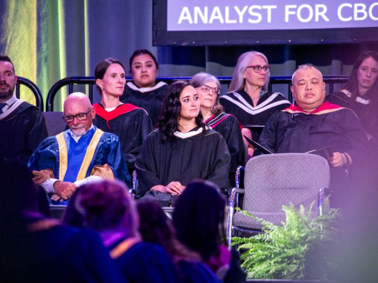 Humber faculty seated on stage