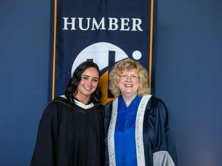 Honorary degree recipient Kaetlyn Osmond poses with Humber president for photo