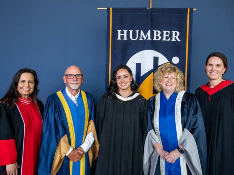 Honorary degree recipient Kaetlyn Osmond poses with Humber faculty for photo