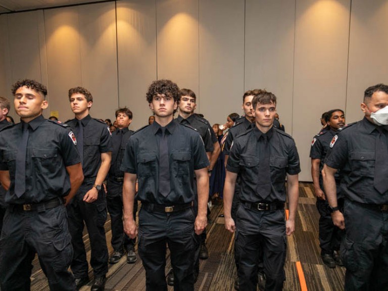 Police graduates standing in uniform