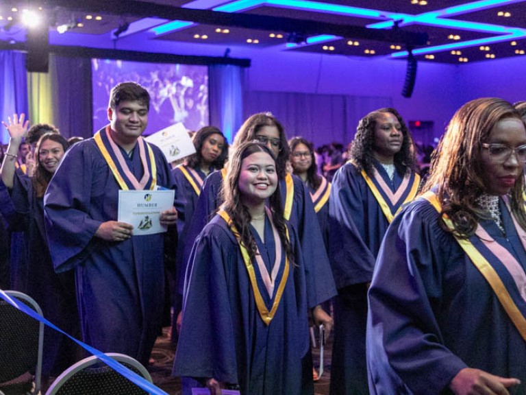 Graduates leave ceremony hall