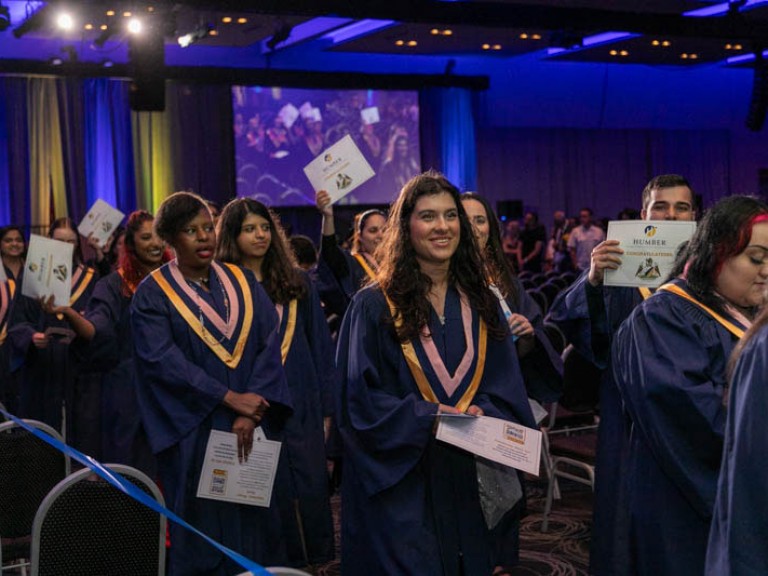 Graduates leave ceremony hall