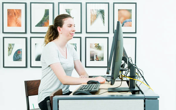 girl looking on computer