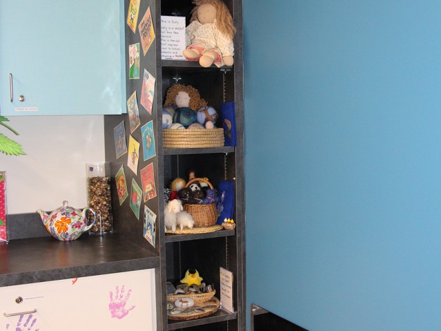 rack full of children stuff toys