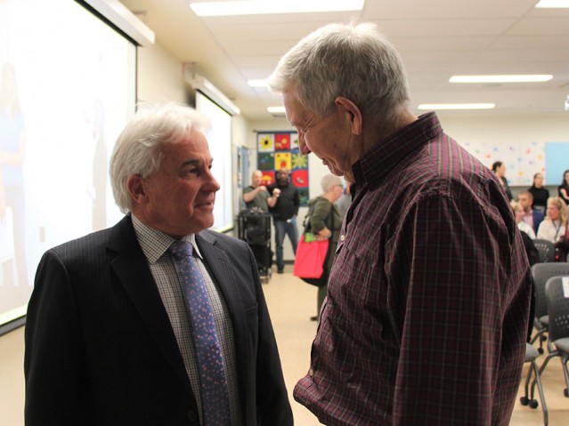 two men in a conversation