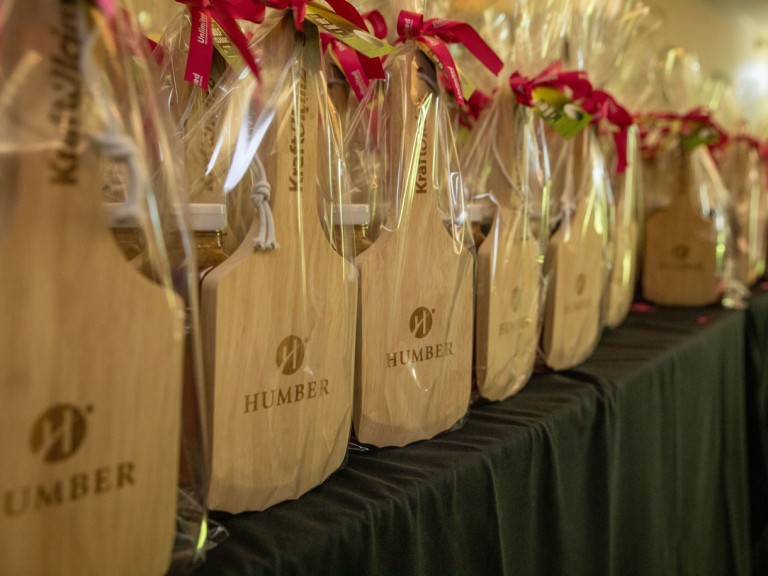 Table with plastic wrapped Humber gifts