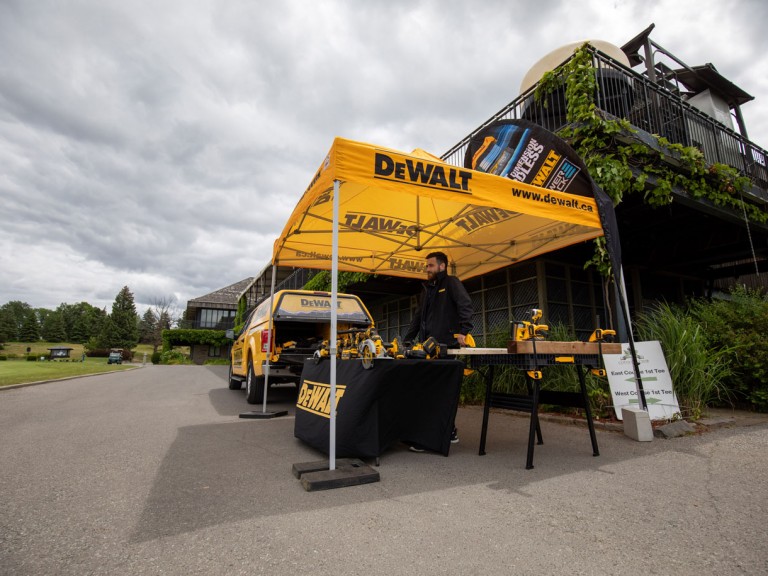 DeWalt construction company table booth outside country club