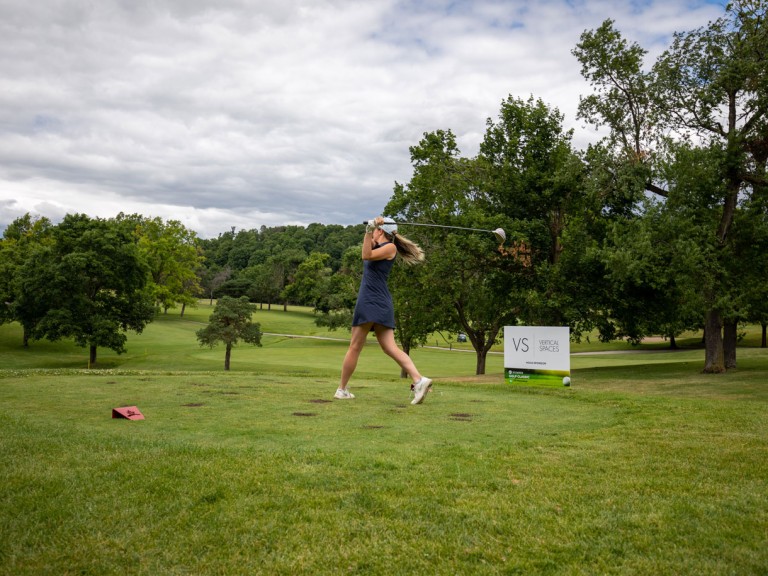 Golfer on course after swing shot