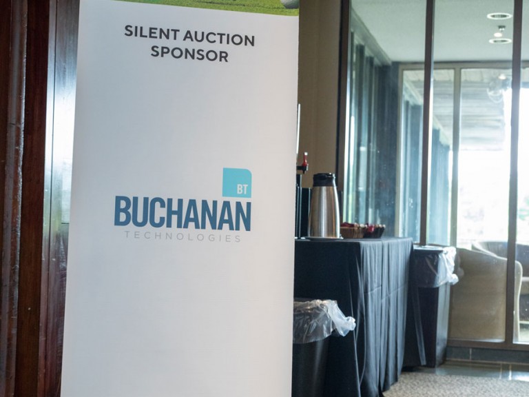 Banner that reads: Silent Auction Sponsor Buchanan Technologies