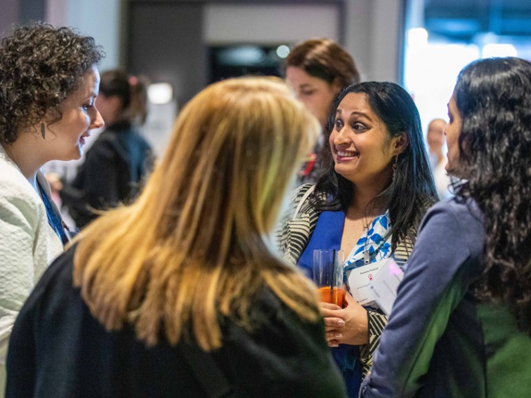 People talking at event reception