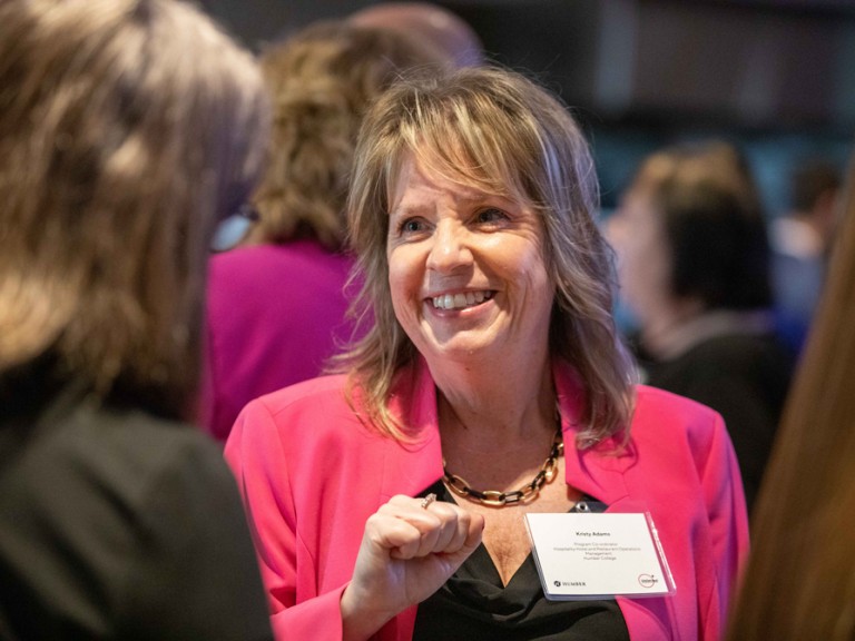 Woman smiling at someone