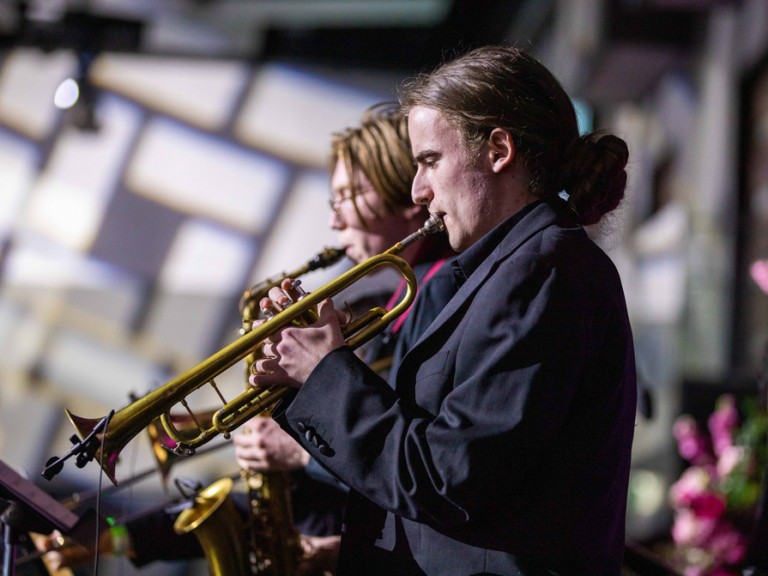 Side profile of trumpet player