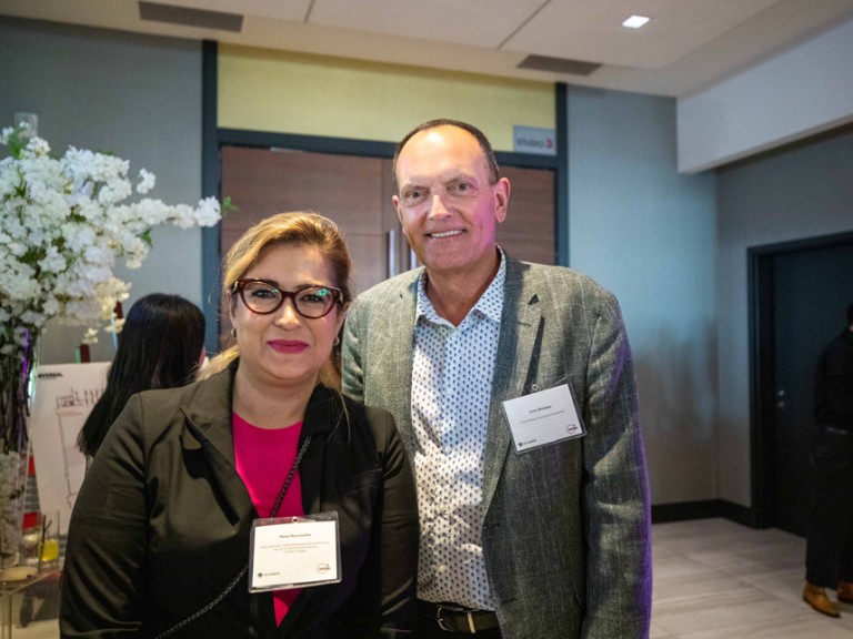 Former Humber president Chris Whitaker posing with event attendee