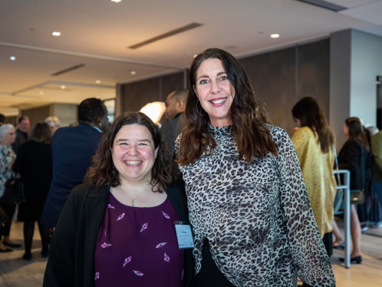 Two people smiling for camera