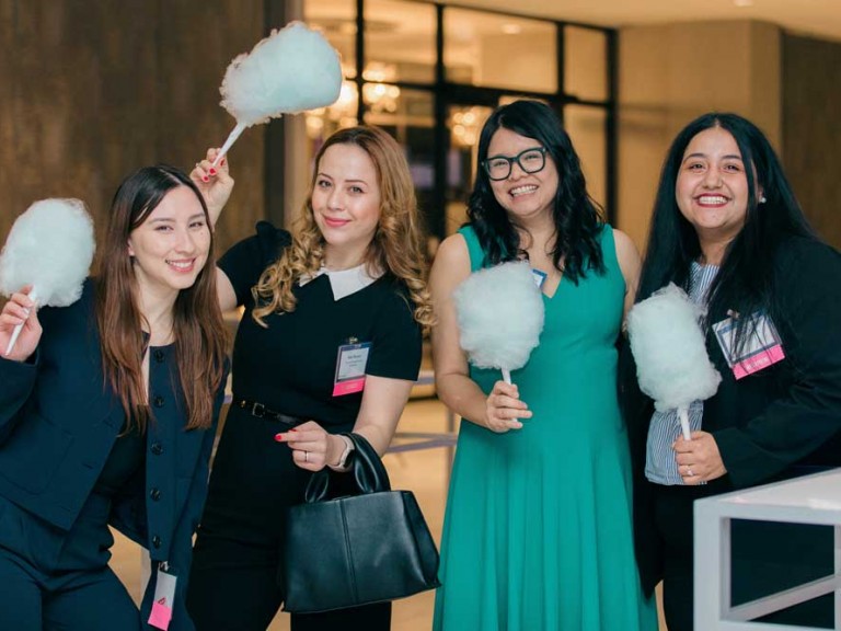 People holding cotton candy